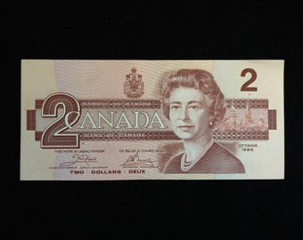 1986 Canada Two Dollar Canadian Banknote. Various Grades Available