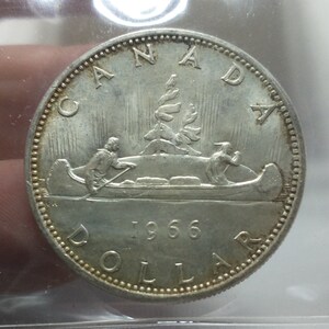 Canadian 1966 Silver Dollar. ICCS. Grade: MS65. Certificate XWF 353 ...