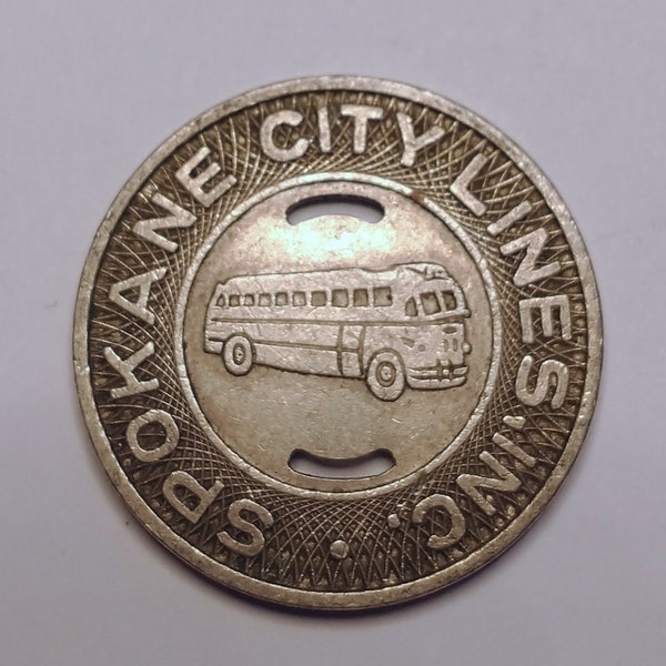 Spokane City Lines (Washington) school transit token (Year: 1954) WA840R (23L06L42a)