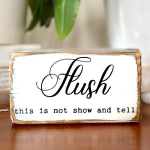 Flush this is not show and tell. Farmhouse style decor. Funny bathroom signs. funny toilet sign. Small wooden sign.