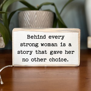 Behind every strong woman is a story that gave her no other choice - office desk wood sign-wooden shelf sitter-encouragement gift