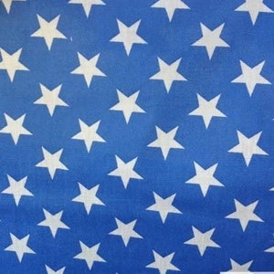 May include: Blue fabric with a white star pattern. The stars are evenly spaced and cover the entire fabric.