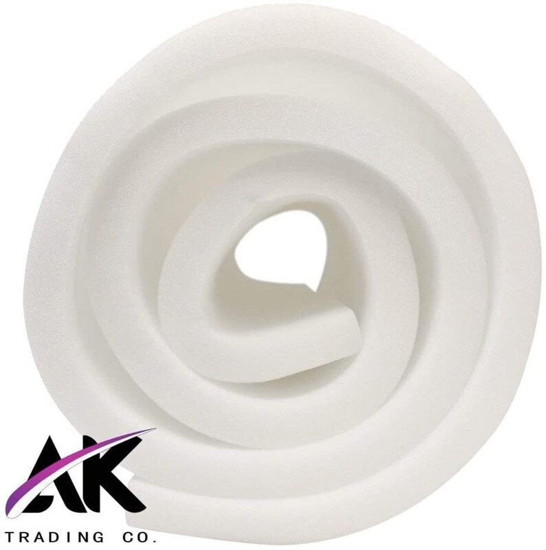 May include: A white foam roll, rolled up tightly, with a white background.