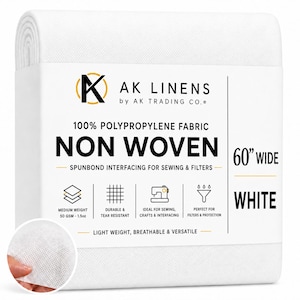 May include: A roll of white non-woven polypropylene fabric by AK Linens, labeled as 60 inches wide. The packaging features text including 100% polypropylene fabric, spunbond interfacing for sewing and filters, and 50 GSM - 1.5oz weight.