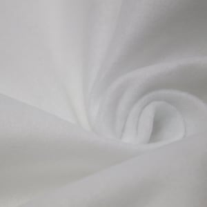 May include: White fabric with a soft, smooth texture. The fabric is folded and draped, creating a smooth, flowing look.