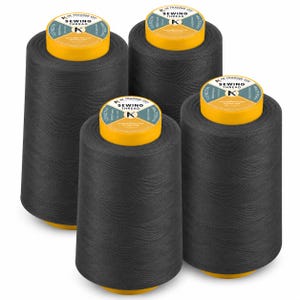 May include: Four large spools of black sewing thread arranged in a group. Each spool features a bright yellow top and bottom cap with a circular label that reads KAK TRADING CO. SEWING THREAD, including a central K logo and text details.