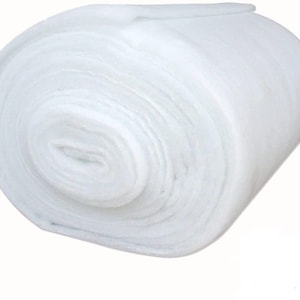 May include: A white, rolled up, polyester batting for quilting, crafts, and other projects.
