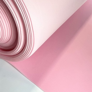 May include: A roll of pink foam sheet material. The foam is soft and flexible, and it is perfect for crafting and other projects.