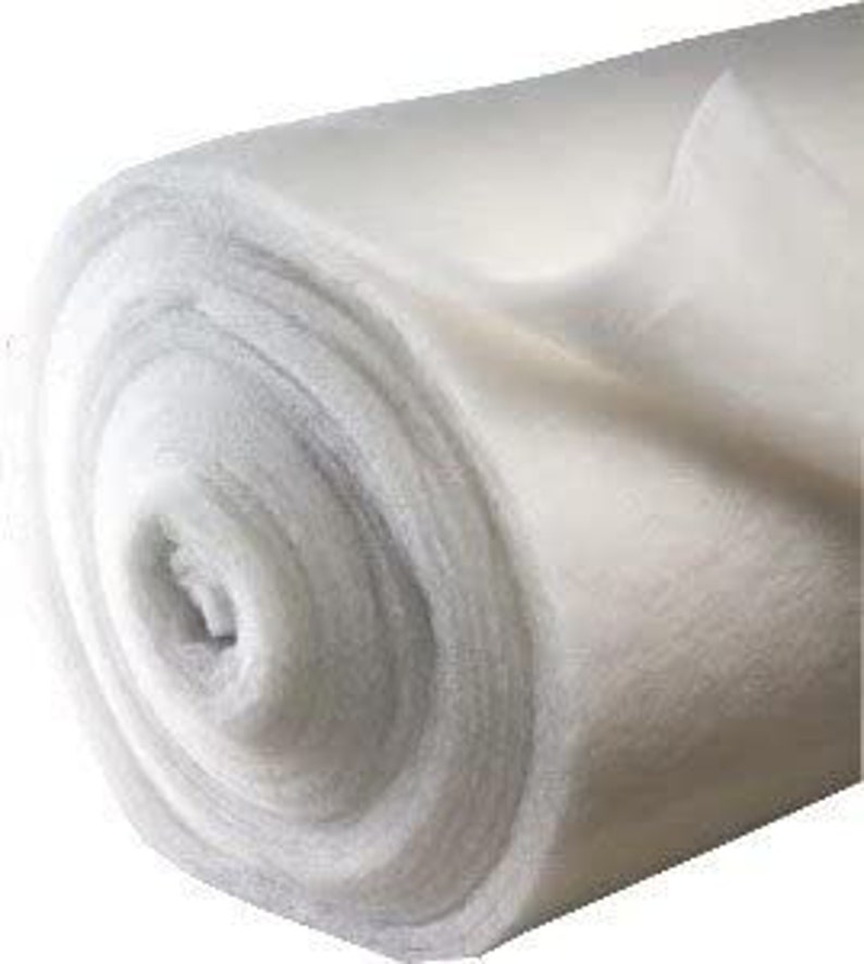 May include: A white roll of landscape fabric, a type of weed barrier used in gardening.
