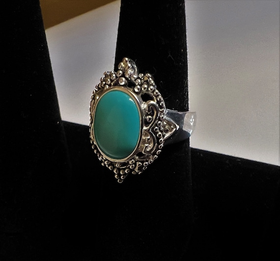 Vintage Sterling Silver 925 Hallmarked Turquoise Ring With a Center Bezel Set Stone Surrounded by Marcasite W Swirls and Dots. US Size 7.5. - Etsy Canada Vintage Sterling Silver 925 Hallmarked Turquoise Ring With a Center Bezel Set Stone Surrounded by Marcasite W Swirls and Dots. US Size 7.5. - Etsy Canada