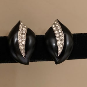 P.E.P. Erwin Pearl 1980&#39;s  black clip on earrings with a band of clear rhinestones through the center of the earrings