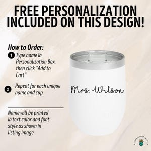 May include: White stainless steel wine tumbler with a silver lid. The tumbler has the text "Mrs. Wilson" printed on it in black cursive font.