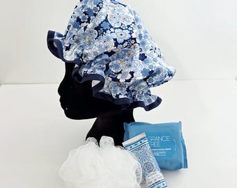 Blauwe douchemuts met bloemen