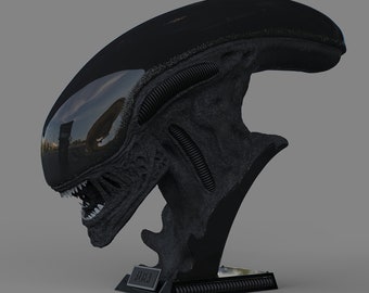 Puede incluir: Busto negro de Alien con cabeza brillante y piel texturizada. El busto presenta la distintiva cabeza alargada de la criatura, detalles acanalados y dientes afilados. La base tiene la palabra "ALIEN".