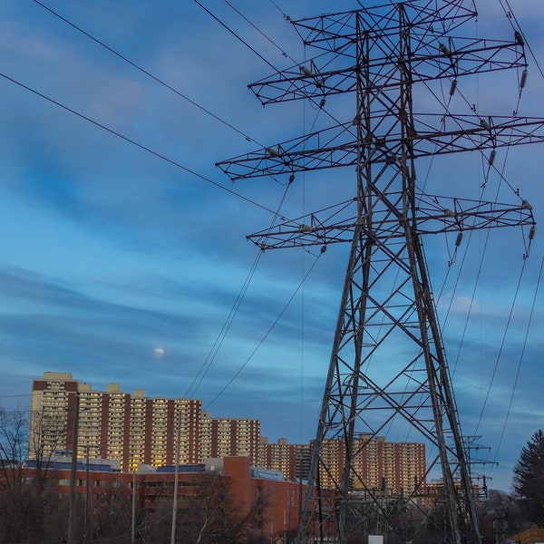 Moonrise with Pylon and child running