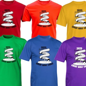 May include: A collection of six short-sleeved t-shirts in red, orange, yellow, green, blue, and purple. Each shirt features a white and black graphic of a water slide with the text "2025 GREAT WOLF LODGE".