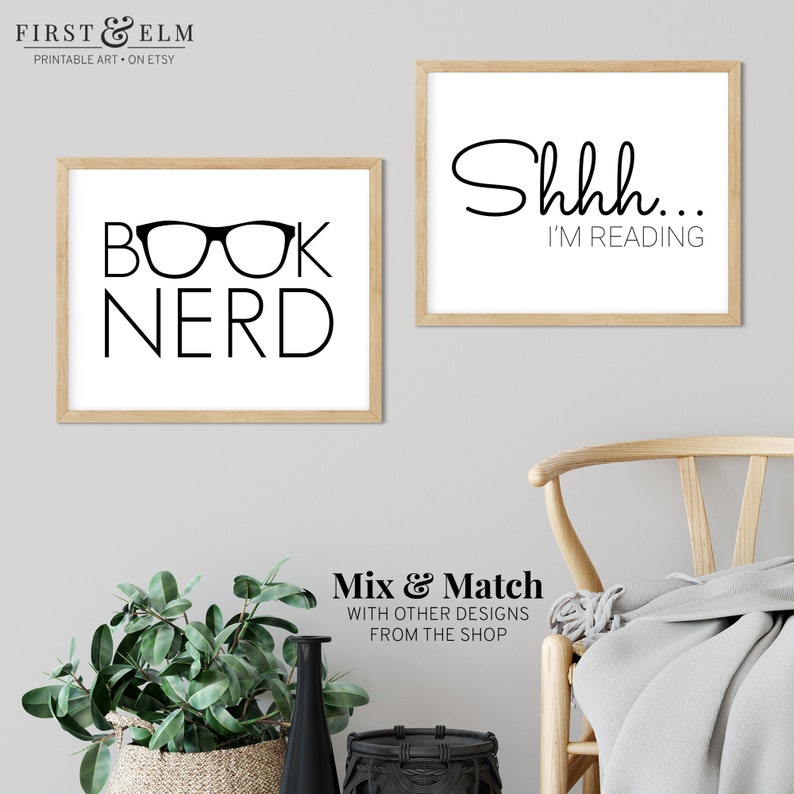 May include: Two printable wall art prints with black text on a white background. The first print features a pair of glasses and the text "BOOK NERD". The second print features the text "Shhh... I'M READING".