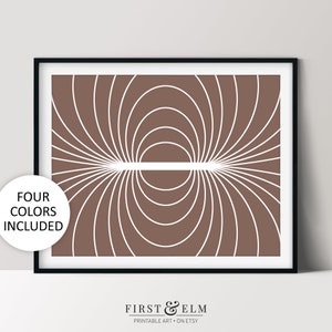 May include: Abstract geometric print with a brown background and white lines forming concentric circles and a horizontal line in the centre. The print is framed in a black frame.