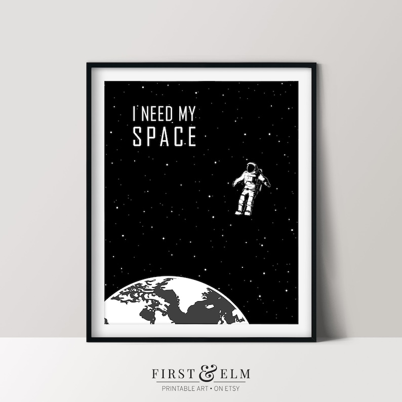 May include: Black and white illustration of an astronaut floating in space with the text "I need my space" above a black and white image of Earth.