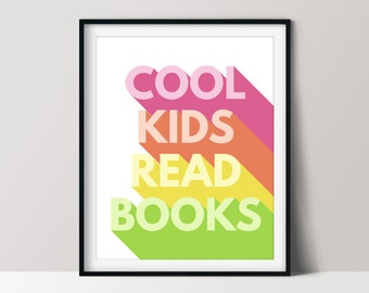 May include: A colorful printable wall art print with the text "COOL KIDS READ BOOKS" in a retro style with a shadow effect. The text is in a rainbow color scheme with pink, orange, yellow, and green.