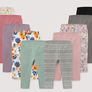 May include: A set of eight leggings in various colors and patterns, including floral, geometric, and solid colors. The leggings are made of a soft, stretchy fabric and are perfect for everyday wear.