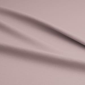 Puede incluir: Una tela suave de color rosa p&aacute;lido con pliegues y arrugas suaves.