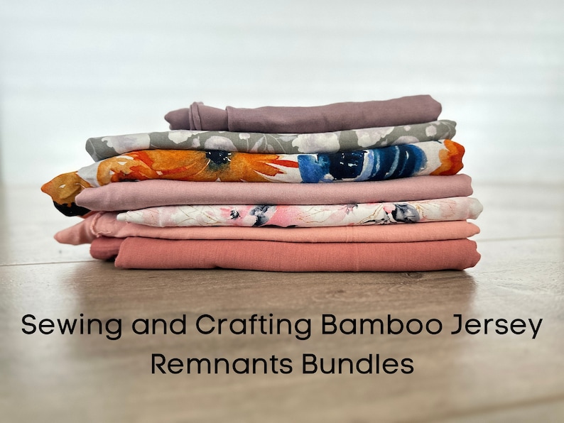 May include: A stack of colorful fabric remnants made of bamboo jersey. The fabrics feature floral patterns and solid colors. Sewing and Crafting Bamboo Jersey Remnants Bundles.