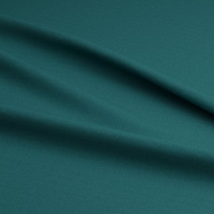 Puede incluir: Una tela lisa de color verde azulado con pliegues y arrugas suaves.