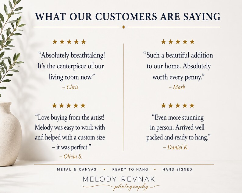 May include: A cream-colored wall art print with the text "WHAT OUR CUSTOMERS ARE SAYING" and customer testimonials. The print includes gold stars, the artist's name, and the phrases "METAL & CANVAS", "READY TO HANG", and "HAND SIGNED".