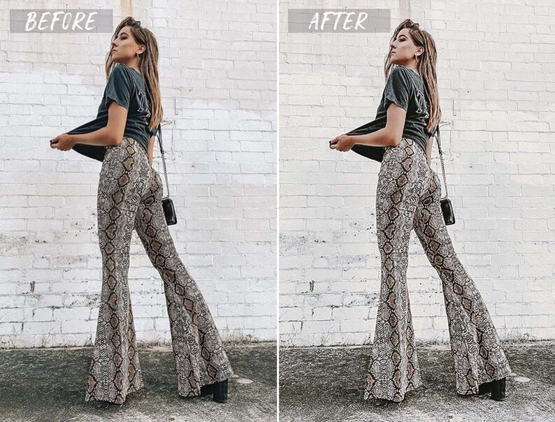 May include: A woman wearing a black t-shirt and brown and white snake print flared pants. She is standing in front of a white brick wall.