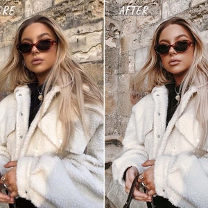 May include: A woman wearing a white shearling jacket with a black turtleneck underneath. She is wearing brown oval sunglasses and has long blonde hair. She is holding a black bag in her left hand.