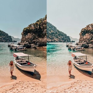 Op de afbeelding: Een vrouw in een witte jurk en een strohoed loopt over een zandstrand naar een witte boot met een wit zonnedak. De boot ligt aangemeerd in een baai met turquoise water en groene kliffen op de achtergrond.
