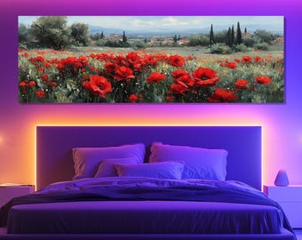 May include: A landscape painting featuring a field of vibrant red poppies in full bloom. The artwork depicts a serene countryside scene with trees, buildings, and a blue sky in the background. The painting is displayed above a bed.
