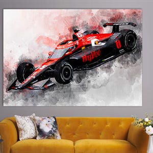 May include: A watercolor-style print of a red and black race car, featuring the number 11 and the "HyVee" logo. The artwork has a dynamic, action-oriented feel, with a blurred background in shades of gray and red.