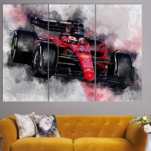 May include: A red Formula 1 race car with black accents and a watercolor background. The car is in motion and the background is blurred.