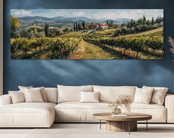May include: A panoramic canvas print depicts a vineyard landscape with rows of grapevines, a villa, and rolling hills under a blue sky. The artwork is displayed above a cream-colored sectional sofa and a round wooden coffee table.