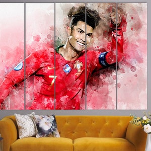 May include: A watercolor painting of a soccer player wearing a red jersey with the number 7 on it. The player is raising his right hand in the air, and the background is a blurred image of a soccer field.