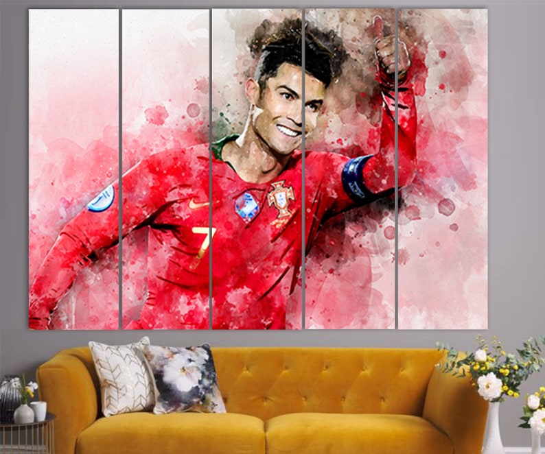 May include: A watercolor painting of a soccer player wearing a red jersey with the number 7 on it. The player is raising his right hand in the air, and the background is a blurred image of a soccer field.