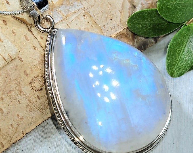 Natural AAAA Grade Multi Full Flash Rainbow Moonstone .925 Sterling Silver Pendant Measures 2 1/8" x 1 3/8" Weighs 24 Grams AM17