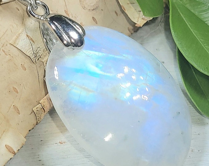 Natural Blue Flash Rainbow Moonstone Oval Cabochon .925 Sterling Silver Pendant Rhodium Plated Sterling Silver Bail  1 11/16" x 13/16" EM02