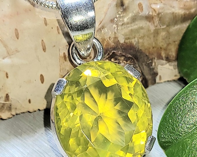 Natural Faceted Lemon Quartz  .925 Sterling Silver Pendant measures 1 1/8" x 9/16" 5 Grams VS Clarity M04