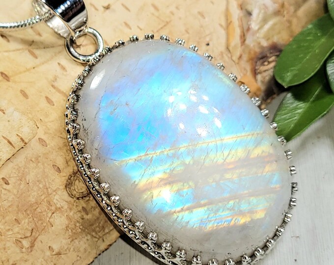 Natural AAAA Grade Multi Full Flash Rainbow Moonstone .925 Sterling Silver Crown Prong Pendant Measures 2" x 1 1/8" Weighs 16 Grams CA27