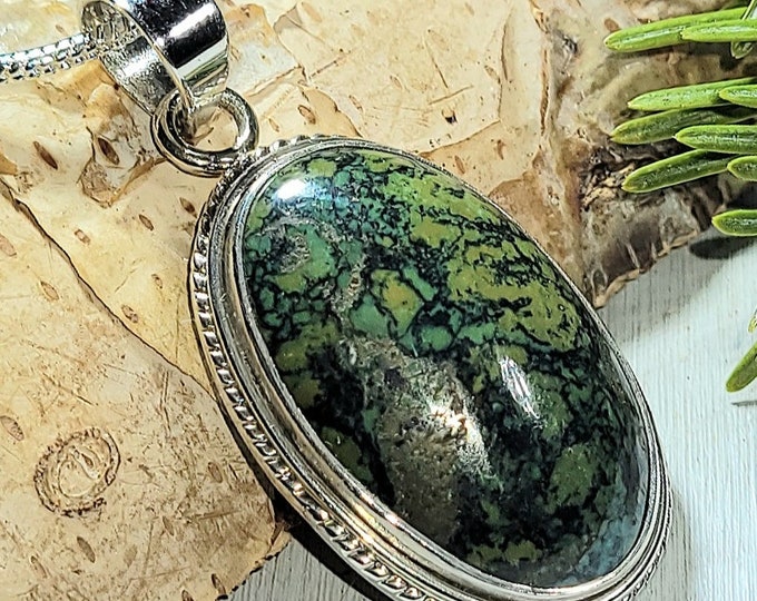 Natural Premium Grade Tibet Turquoise .925 Sterling Silver Pendant Weighs 9 Grams Measures 1 3/4" x 13/16 AK37