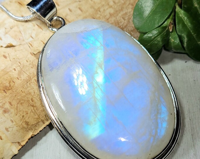 Natural AAAA Grade Multi Full Flash Rainbow Moonstone Oval .925 Sterling Silver Pendant Measures 2 1/2" x 1 1/2" Weighs 32 Grams CF33