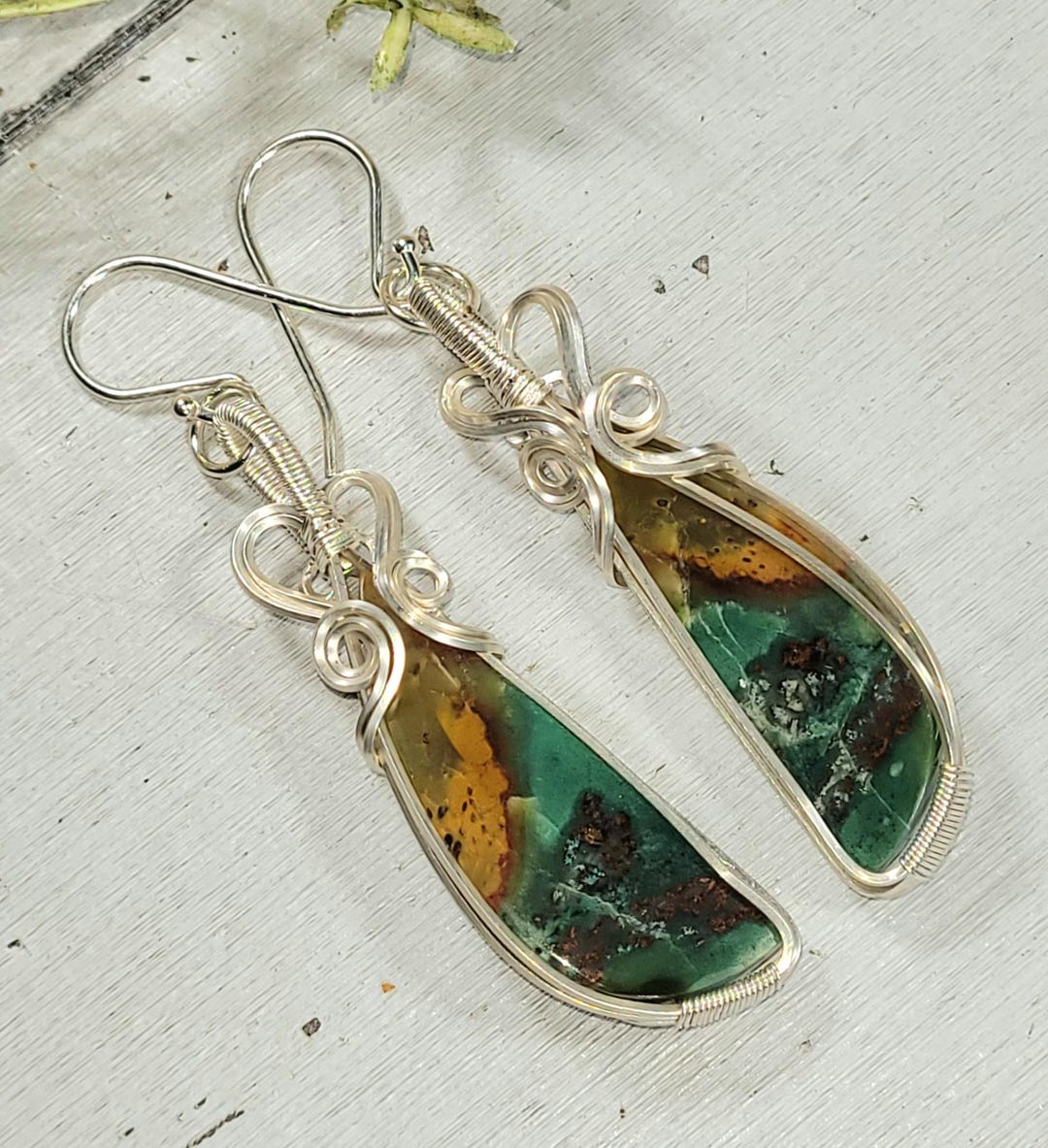 Orecchno con ganco n argento 925 dorato con 2 acquamarne