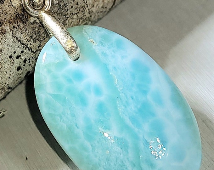 Natural Top Quality Dominican Larimar Oval Cabochon 4 Grams. Bail Is NOT included at this price. Available for an additional 6 Dollars