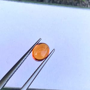 Natural spessartine garnet oval shape cabochon 1.83 cts , fanta color garnet , loose gemstone for jewelry.