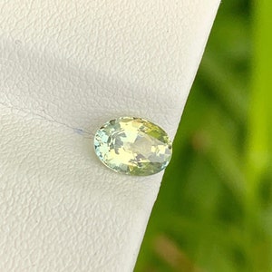 Narural bi color sapphire 7x5 mm oval shape , loose faceted sapphire from Madagascar 1.10 cts