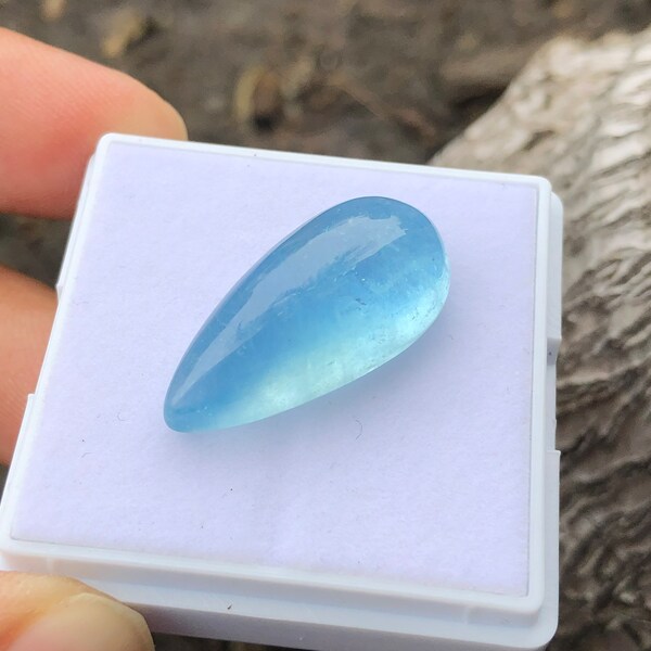 Natural aquamarine cabochon 19.90 carats , santa maria color in drop shape .