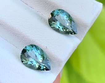 Natural blue tourmaline match pair , 6x9 mm pear shape , loose gemstone for earrings and jewelry. 2.51 cts